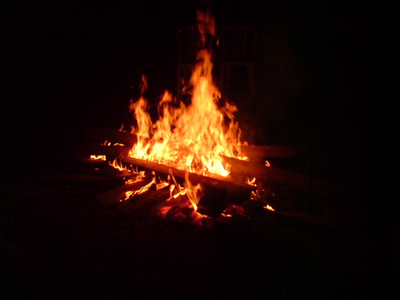 A bonfire burning against the night